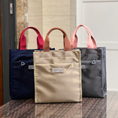 时尚 新款 纯色女士手提包上班通勤轻便手提袋非帆布老人外出手拎袋