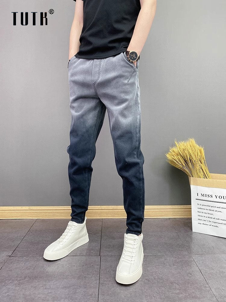 牛仔裤男士夏季新潮品牌修身渐变色休闲裤男士高端帅气绑腿运动裤