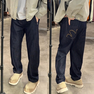 蛇年限定简约刺绣水洗弯刀牛仔裤