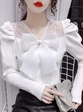 网纱拼接蝴蝶结泡泡袖白色毛衣针织打底衫女春秋2026新款内搭上衣