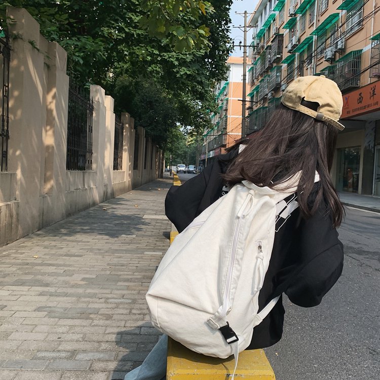 个性三角帆布背包可大可