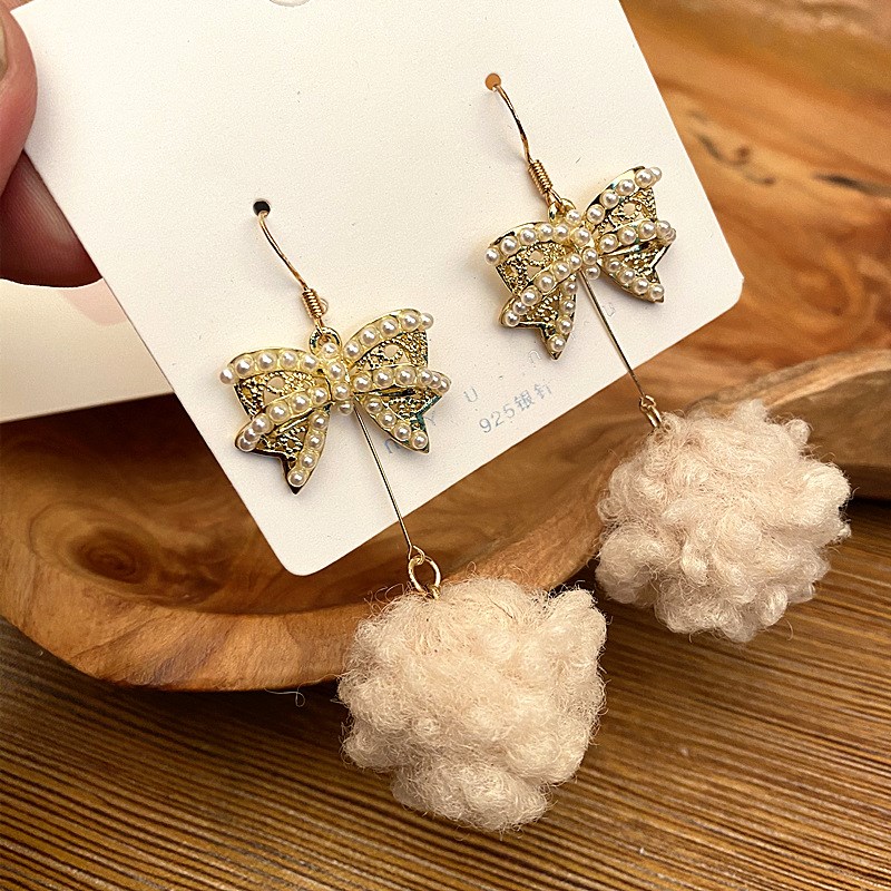 The new super love soft cute hair ball drop earrings temper