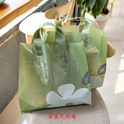 服装店用墨绿色山茶花手提袋加厚14丝装衣服的袋子大塑料包装袋子 - 封面