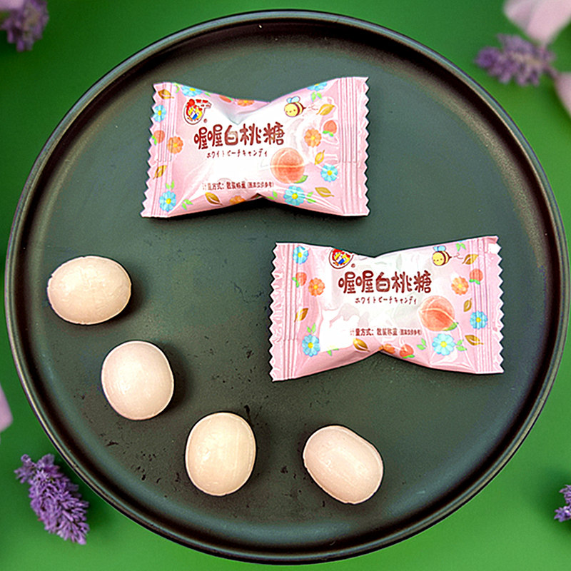 喔喔白桃喜糖水蜜桃味水果糖散装硬糖结婚糖喜庆办公休闲零食糖果