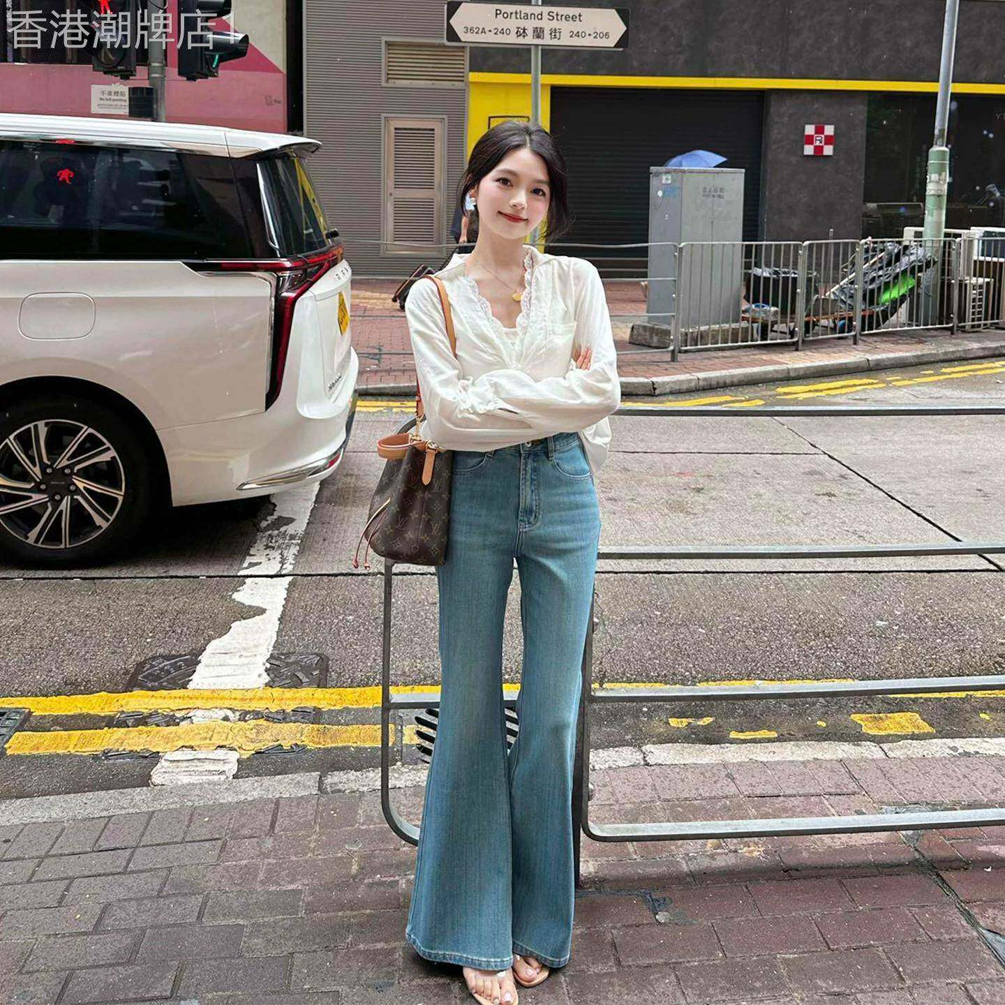 浅蓝色微喇牛仔裤女2026秋季新款高腰宽松不贴腿显瘦喇叭超模裤子