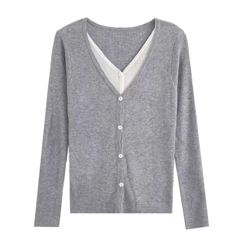 카운터 신상 2024 가을 한국판 시크한 틈새 디자인 부드럽고 밀랍 같은 솔리드 컬러 스티치 가짜 투피스 니트 가디건