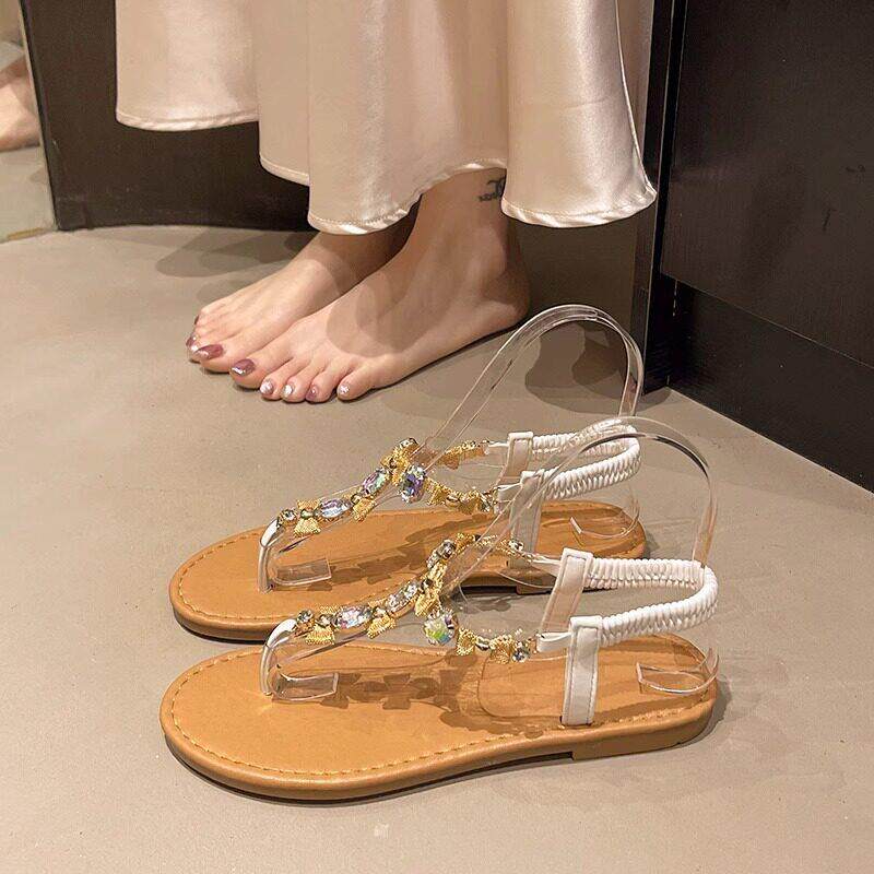 香港真皮平底罗马凉鞋女夏季2026新款配裙子仙女风水钻夹趾沙滩鞋