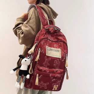 英国  MK DW大容量印花后背包女新款减负护脊学生书包轻便出行登