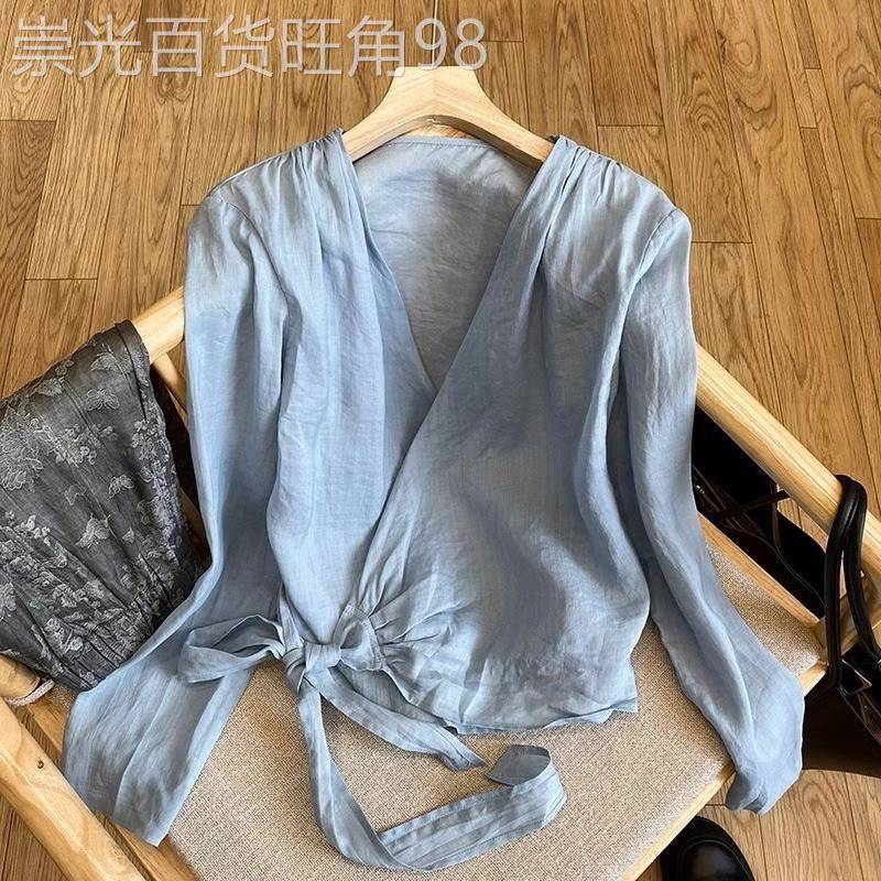蓝色棉麻衬衫女夏季薄款2026新款设计感小众v领防晒衬衣长袖上衣