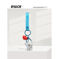 Линия щенка сидит с наклоненной головой - белая