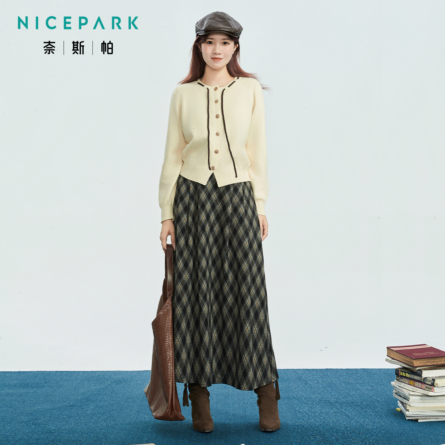 奈斯帕2025秋冬新款韩版学院风针织开衫格子半身裙两件套女高级感
