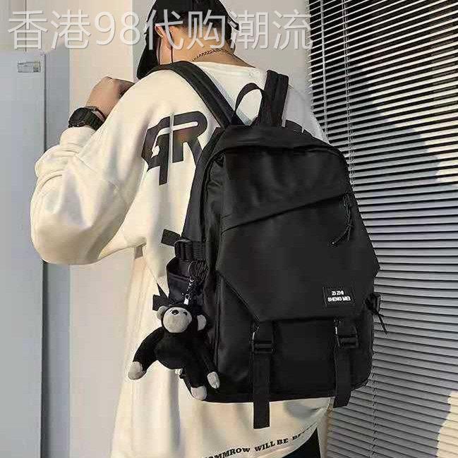 香港大容量初中书包男时尚轻便防水高中学生双肩包女韩版百搭旅行