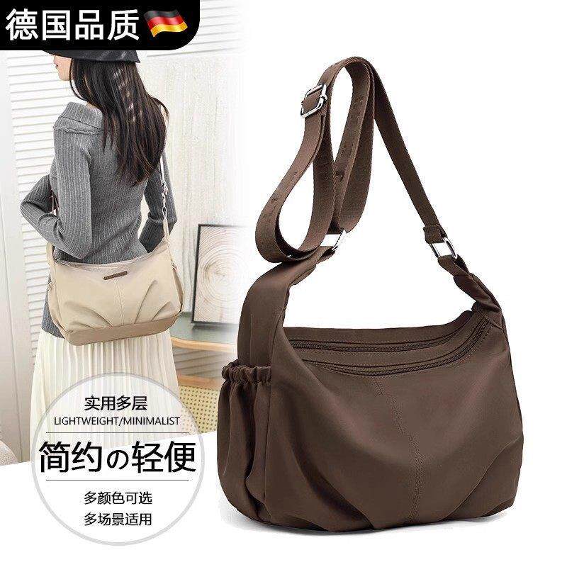德国斜挎包2025新款女包包女式包牛津布多隔层轻便时尚百搭帆布包
