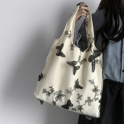 日本进口刺绣蝴蝶蕾丝仙女袋出行女包帆布包文艺大容量百搭单肩包