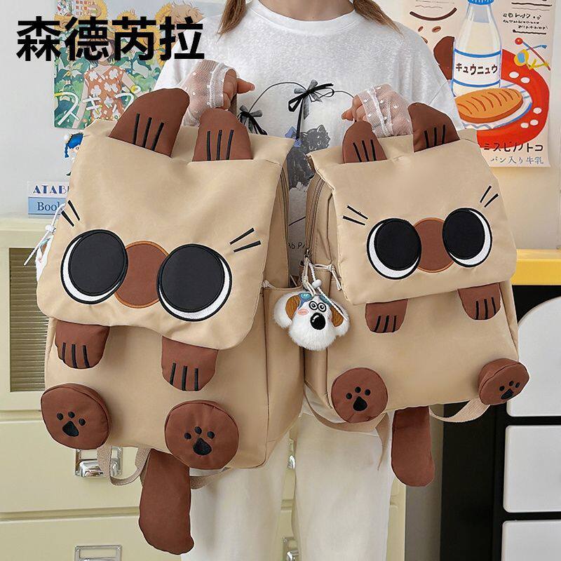 可爱休闲卡通学生背包女生三到初中高中大学双肩包校园轻便小书包