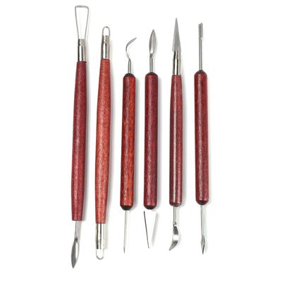 6-piece set of ceramic tools, red wooden double headed radi