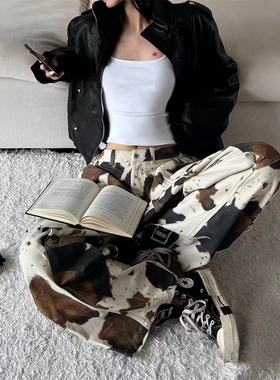 辣妹街头小众设计感奶牛纹显瘦阔腿裤秋冬新款加绒加厚弯刀牛仔裤