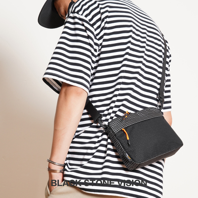 考杜拉黑白经典格纹休闲斜挎包