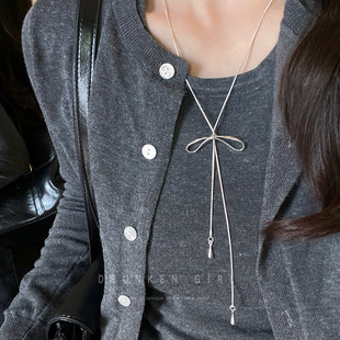 蝴蝶结吊坠长款项链女秋冬银色韩系穿搭装饰毛衣链高级感出游配饰