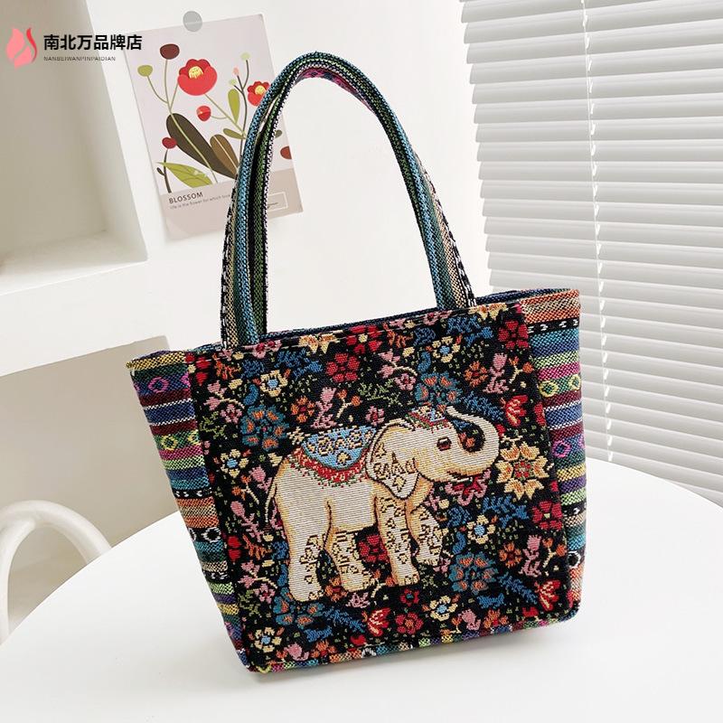 新款包包刺绣帆布手提包女民族风手拎包休闲妈咪手拎饭盒袋小方包
