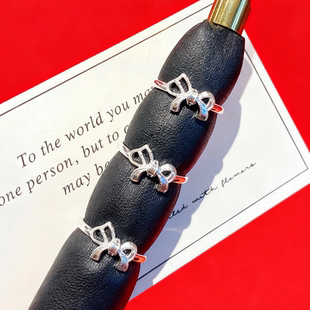 香港正生纯银999足银马年新款蝴蝶结丝带小马活口素银戒指2026年