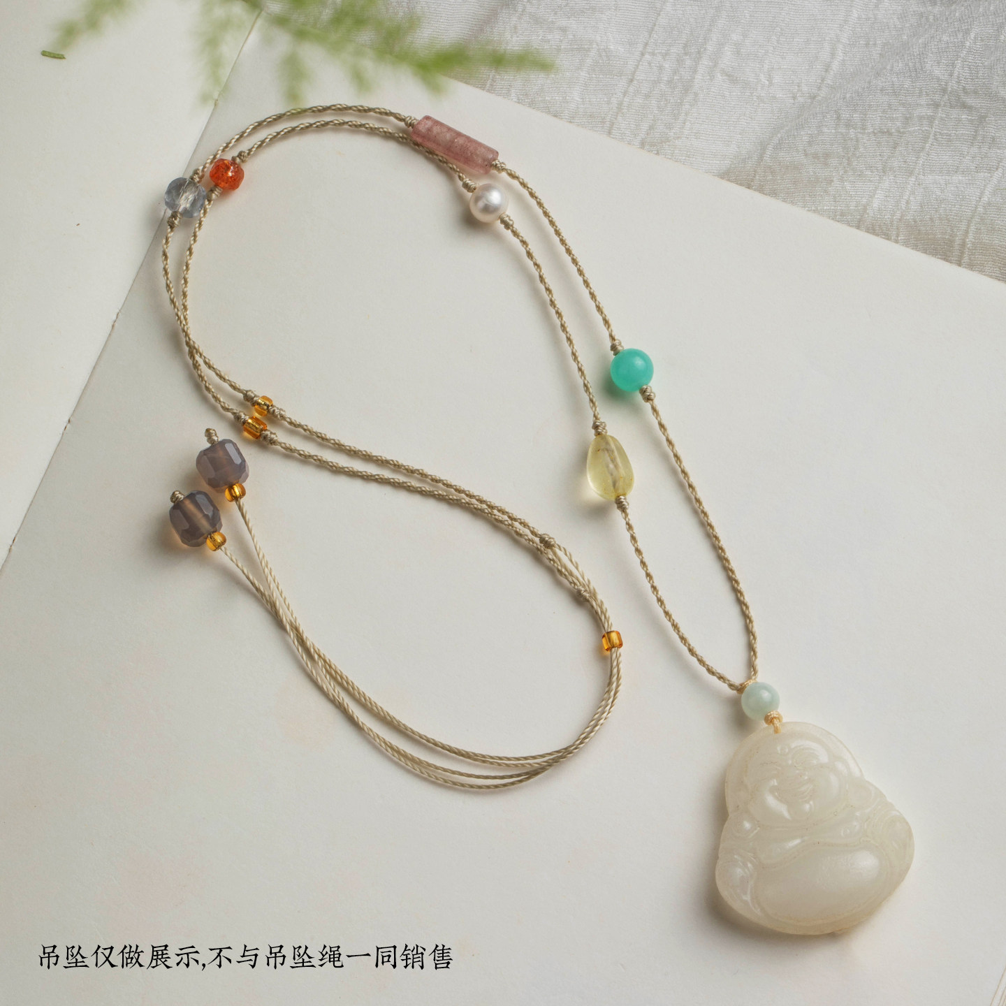 手工编织天然石项链绳金锁玉石图片