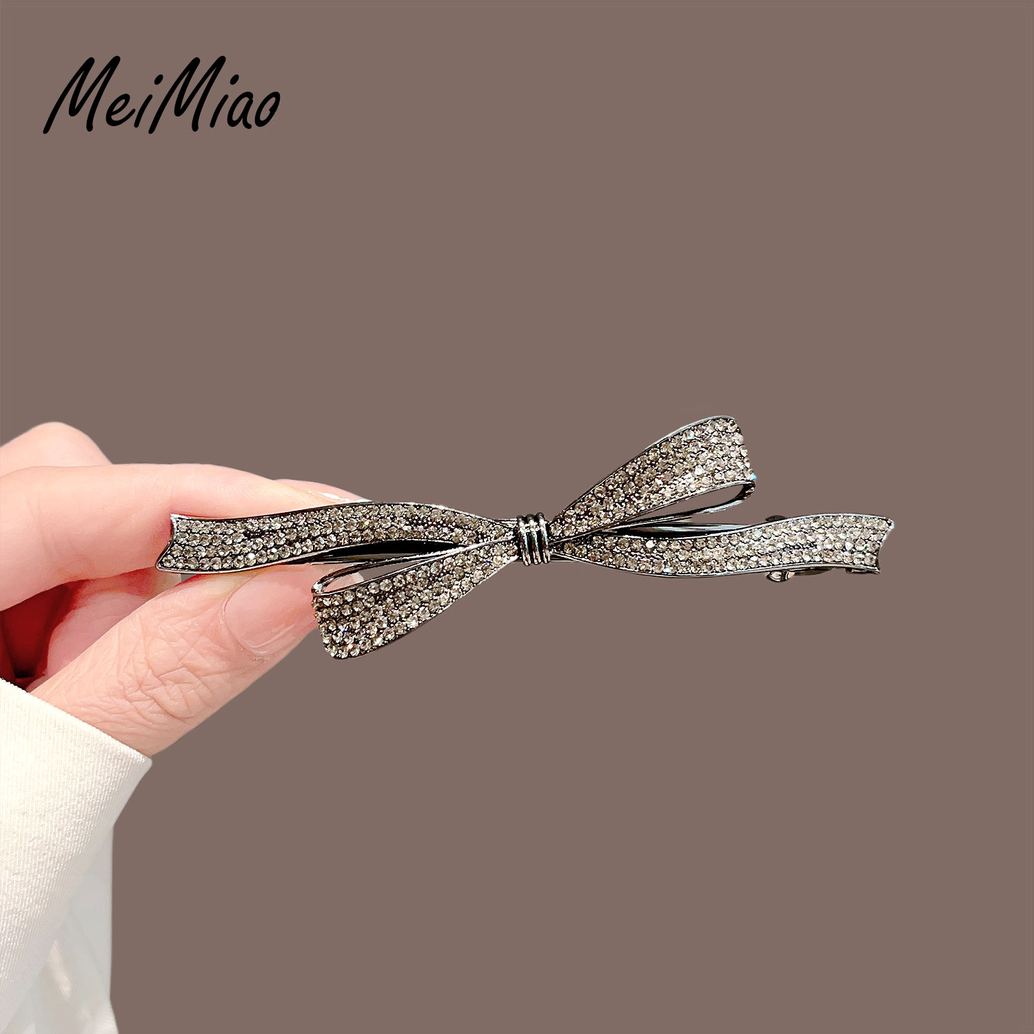 美苗~简约合金水钻蝴蝶结弹簧夹