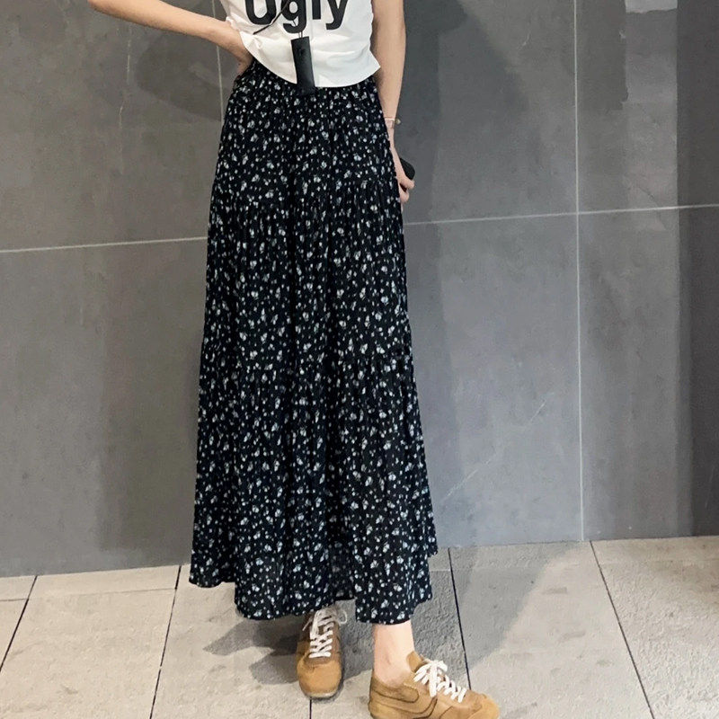 时尚独特气质黑色碎花半身裙女2025夏季新款薄款宽松显瘦A字裙子