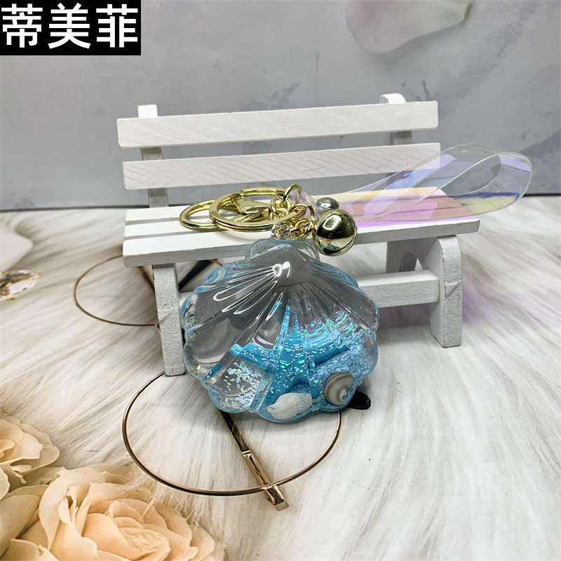 亚克力入油海洋生物钥匙扣挂件流沙海星漂浮瓶钥匙链礼品镭射