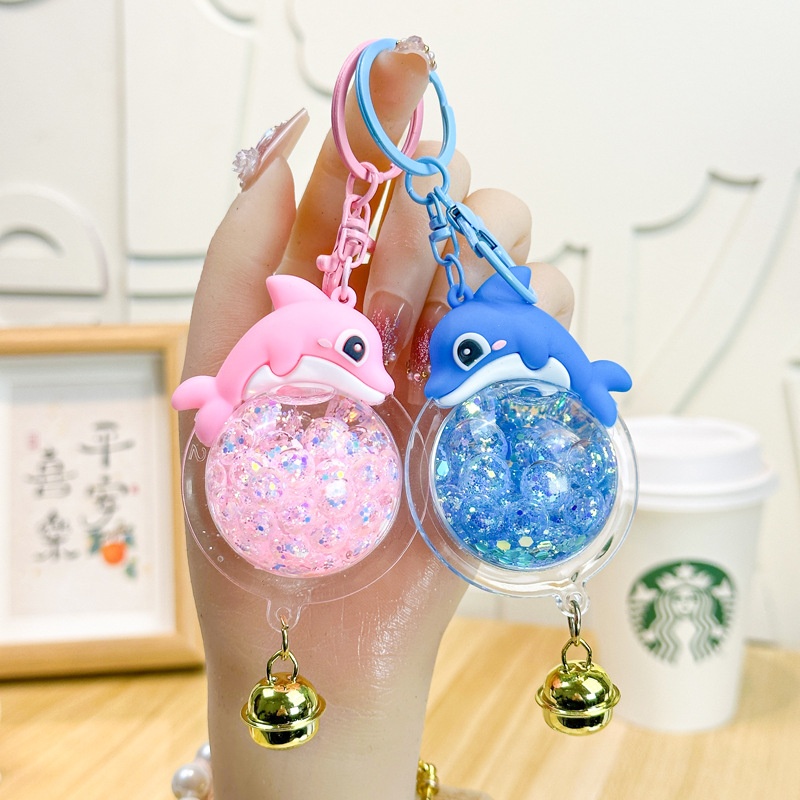 创意入油流沙海豚钥匙扣夜光潮流包包小挂件精致可爱情侣礼品