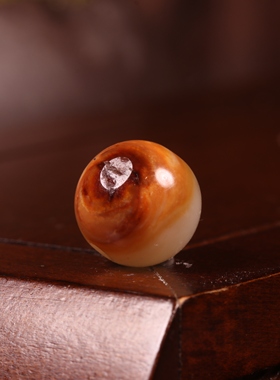 新疆和田玉籽料红皮珠子