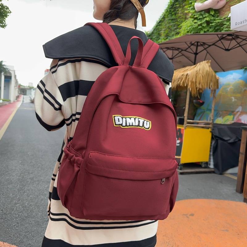 官方正品2026夏季款韩系复古简约百搭字母大容量双肩包女初高中大
