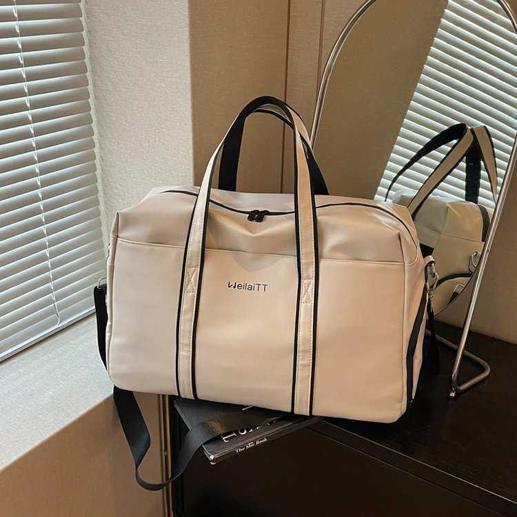 官方正品旅行包女大容量短途轻便行李包瑜伽包旅游健身包防水收纳