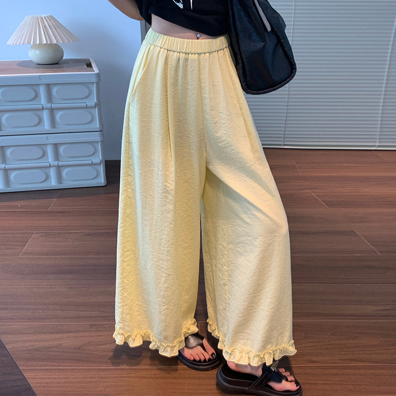 黄色亚麻裤子女2025新款夏季薄款棉麻阔腿裤裙木耳边半身花苞裙裤