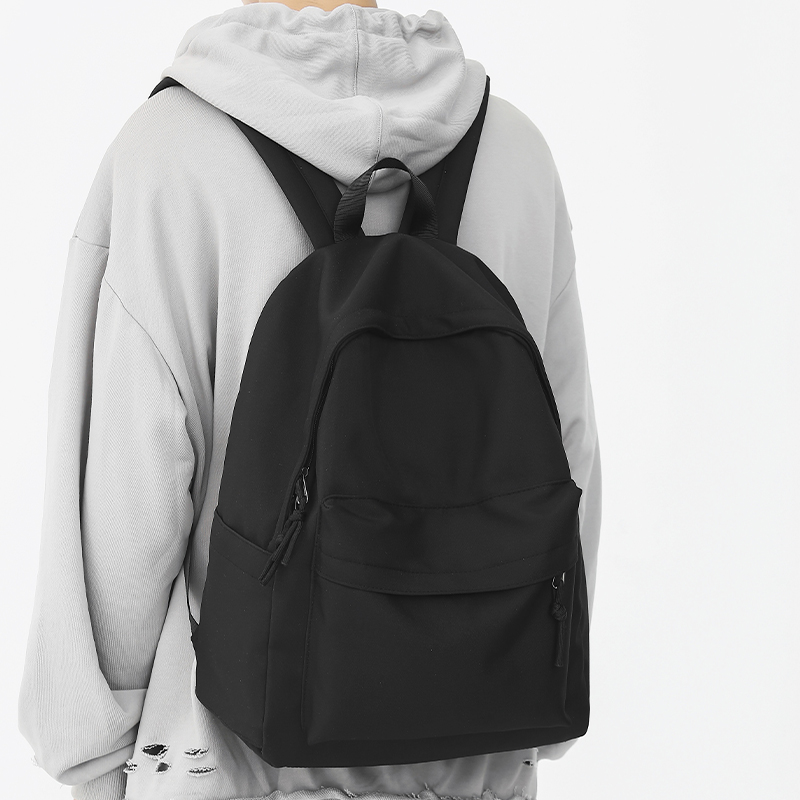 简约书包男初中高中大学生电脑小背包女旅游轻便高颜值黑色双肩包