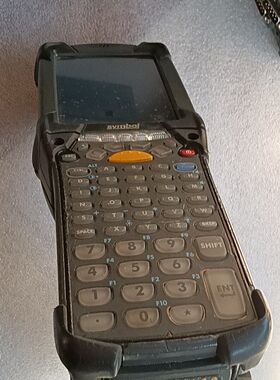 出一款讯宝品牌的MC9190采集器 黑色外观搭配橙色按键 设