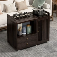 Bàn trà phòng khách 2024 mới bàn trà nhỏ không phải gỗ nguyên khối bàn trà ấm đun nước tích hợp tủ trà hộ gia đình có bánh xe bên bàn bàn trà bệt