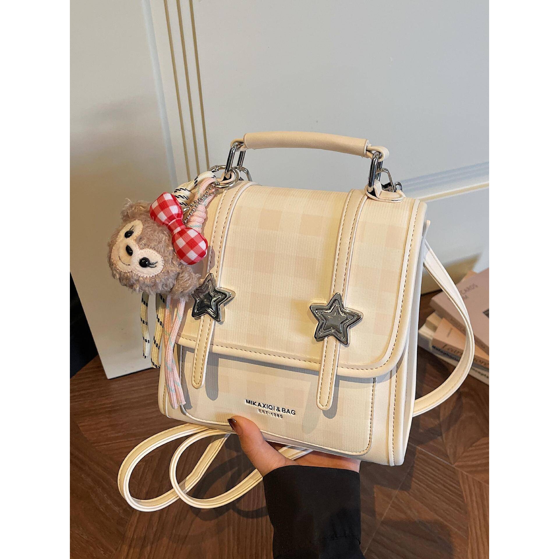 高档品牌时尚潮流双肩包女士2026新款简约学生小背包高级感轻便斜