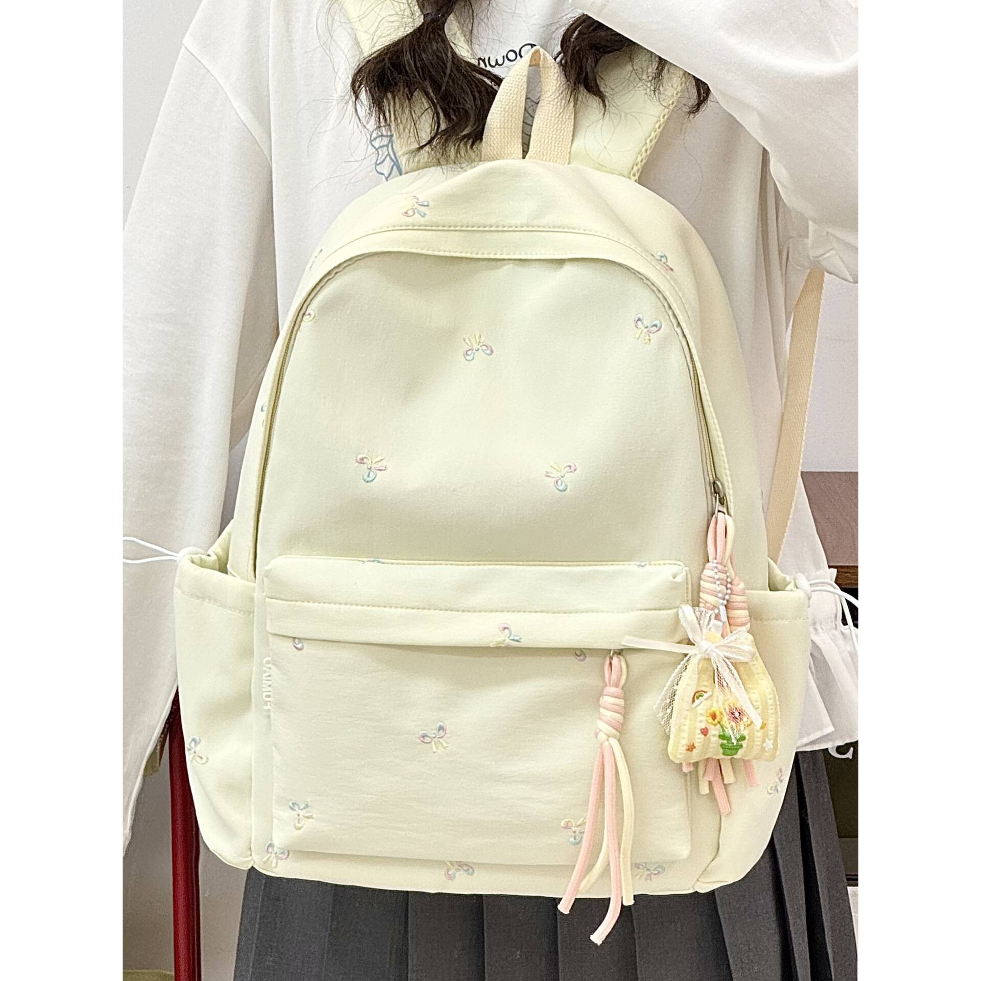 品牌新款学院风书包休闲大容量少女蝴蝶结背包韩版印花初中学生双