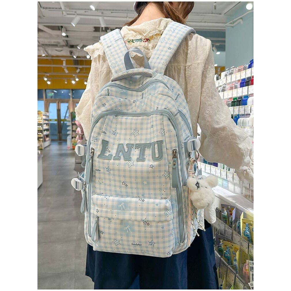 品牌奶蓝格纹梦幻星星蝴蝶结印花少女背包3-6年级学生盐系清新风