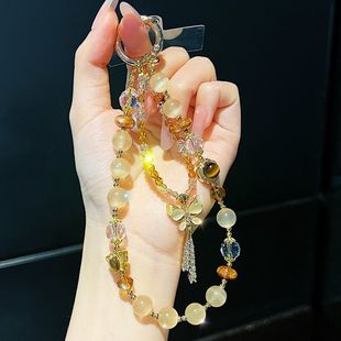 美拉德虎眼色串珠蝴蝶流苏手机链精致百搭包挂件ccd相机挂饰品