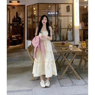 法式温柔风白色少女学生吊带连衣裙子女夏季新款穿搭法式气质长裙