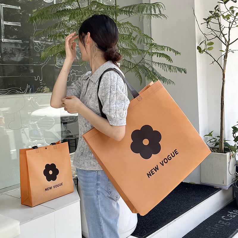 速发高档服装店无纺服购物带袋包手提袋礼品礼打装衣布包装袋子