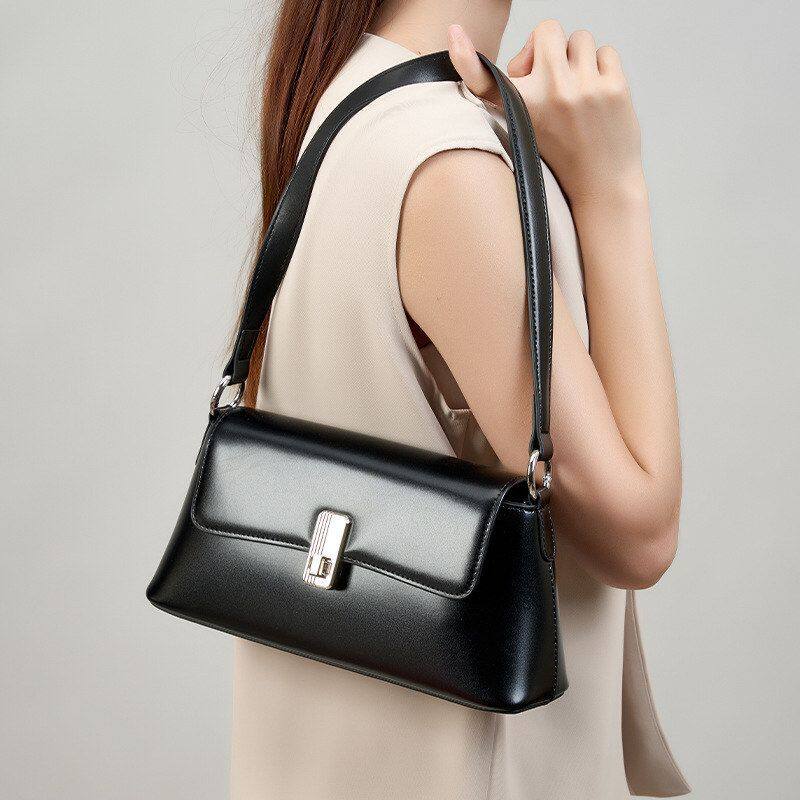 腋下韩系斜挎包单肩包小众女士法式黑色女生通勤法棍高级感真皮