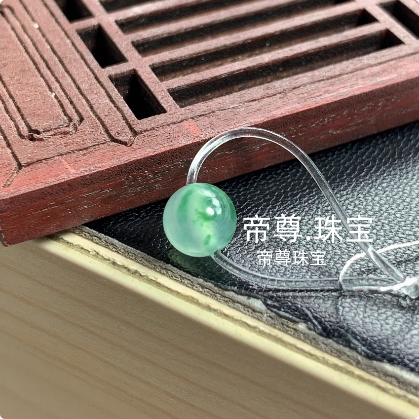 白冰种飘绿花圆珠子玉石单珠