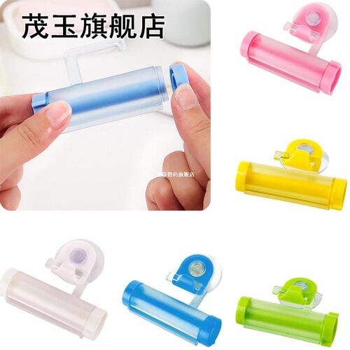 Rolling Squeezer Toothpaste Dispenser Tube Sucker Holder Den