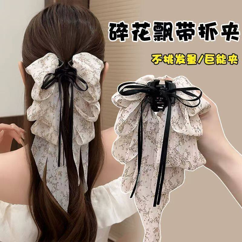 蝴蝶结碎花飘带抓夹女高级感2026新款发夹后脑勺半扎发鲨鱼夹头饰