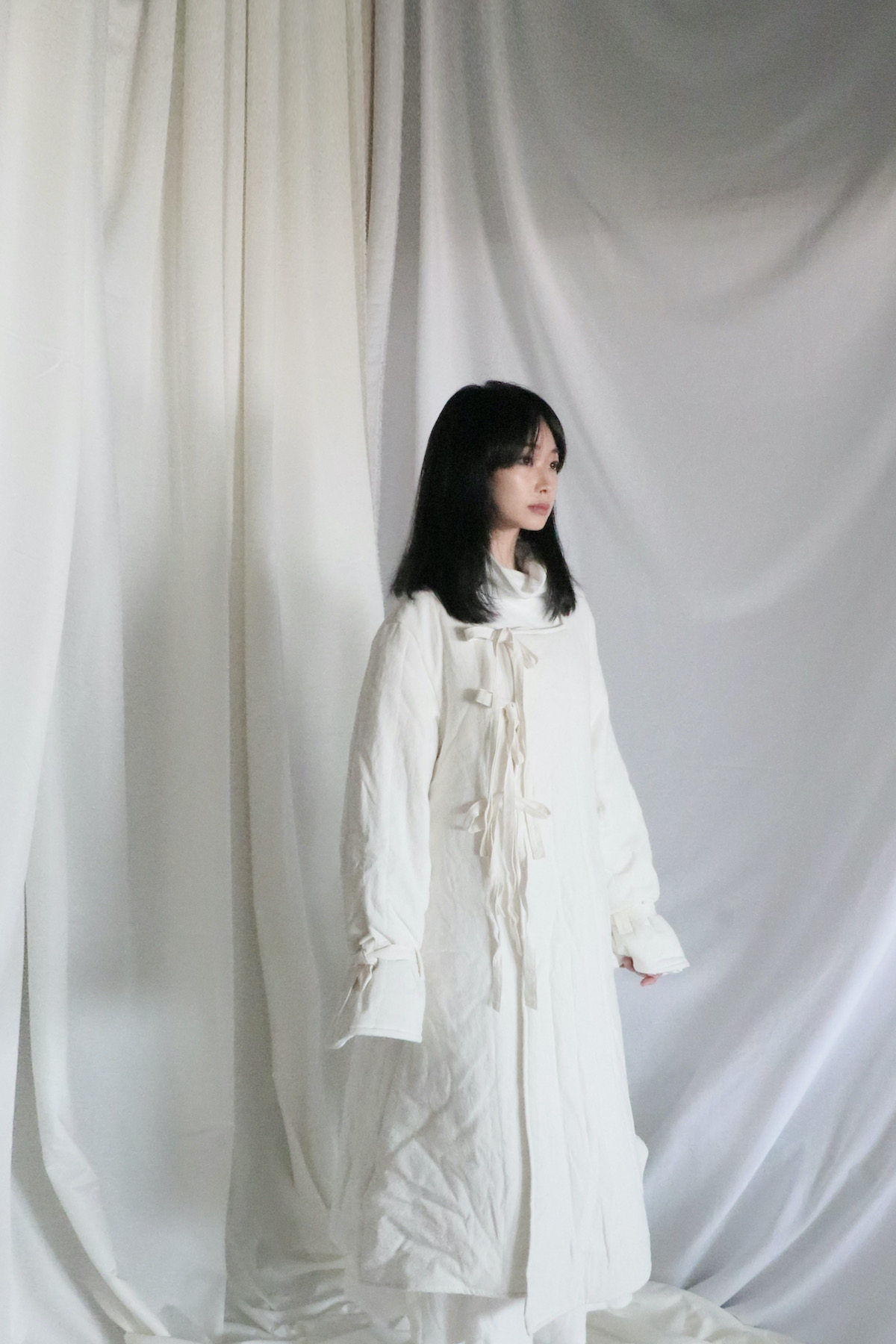 野昭2022一杯無03.消白夹棉绗缝收缩蓬蓬保暖方领加厚三系带风衣