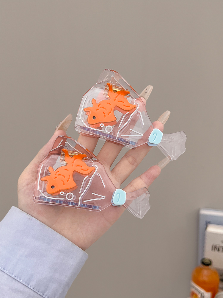 thumbnail for A bag of goldfish grab clips on the back of the woman's head and half tied hairshark clips ins style hairpin cards fun and cute hairpin headwear summer