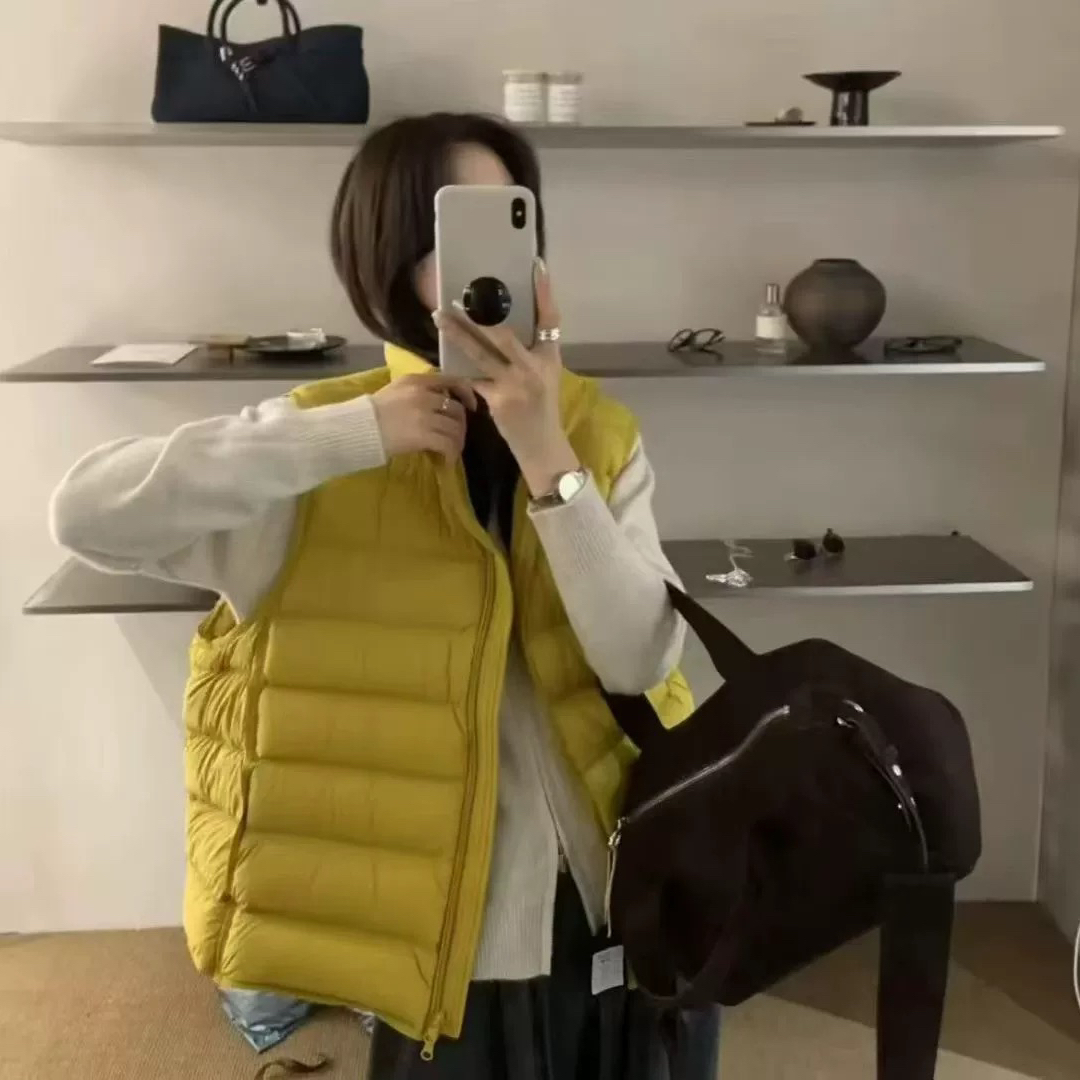 米米冬上新轻奢绗缝排骨羽绒马甲8618